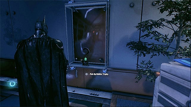 Break the glass and take the trophy - Riddler trophies in GD Lockup | Collectibles - GD Lockup - Collectibles - GD Lockup - Batman: Arkham Knight Game Guide & Walkthrough